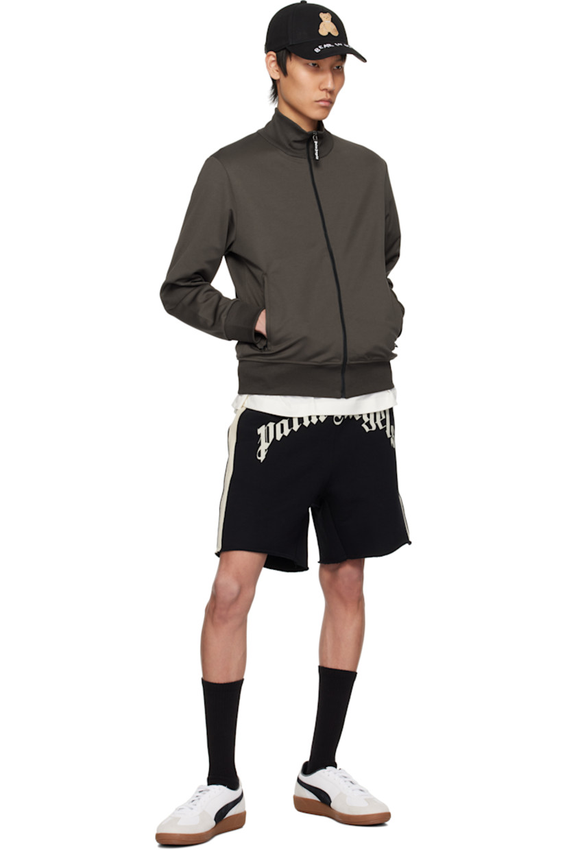Polyester jersey track jacket. 

· Rib-knit stand collar, hem, and cuffs
· Zip closure
· Zip pockets
· Logo printed at back

Supplier color: Vintage black