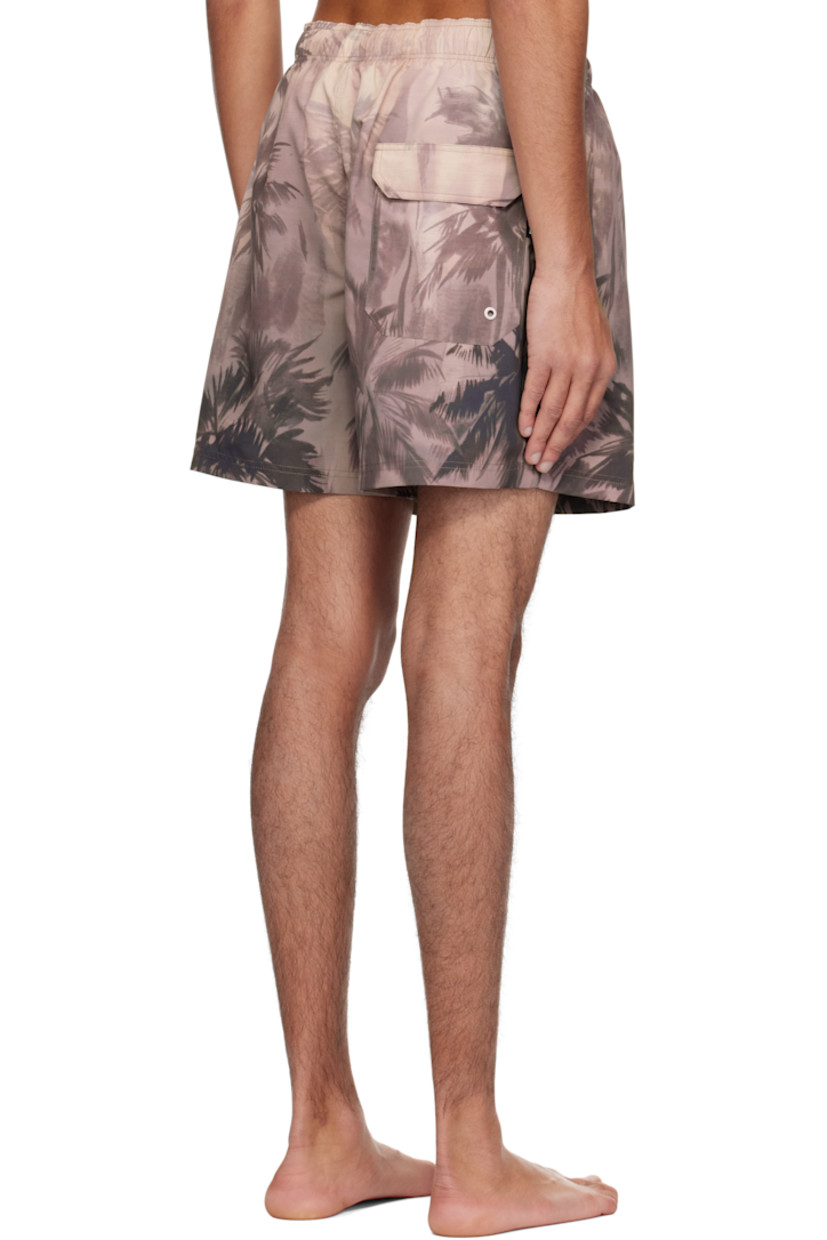 Polyester taffeta swim shorts. Graphic pattern printed throughout.

· Drawstring at elasticized waistband
· Three-pocket styling
· Logo flag and eyelet vent at back pocket
· Partial mesh lining

Supplier color: Beige/Black