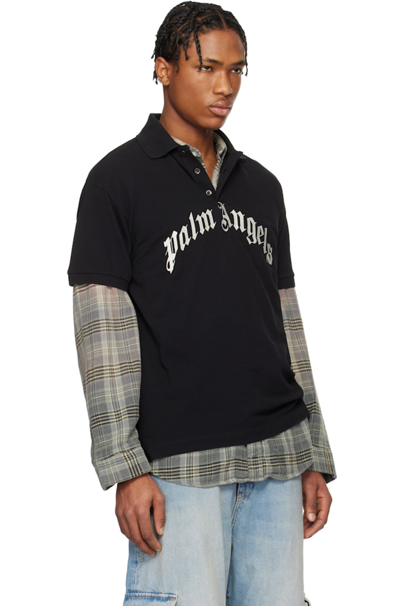 Cotton piqué polo.

· Rib-knit spread collar and cuffs
· Three-button placket
· Embroidered logo at front
· Logo flag at side seam
· Tennis-tail hem
· Dropped shoulders

Supplier color: Black