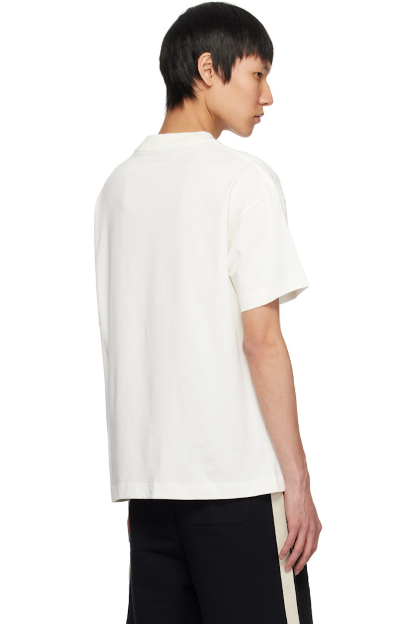 Cotton jersey T-shirt. 

· Rib-knit crewneck
· Graphic printed at front
· Logo and text bonded at front
· Logo flag at side seam
· Dropped shoulders

Supplier color: Brown/Grey