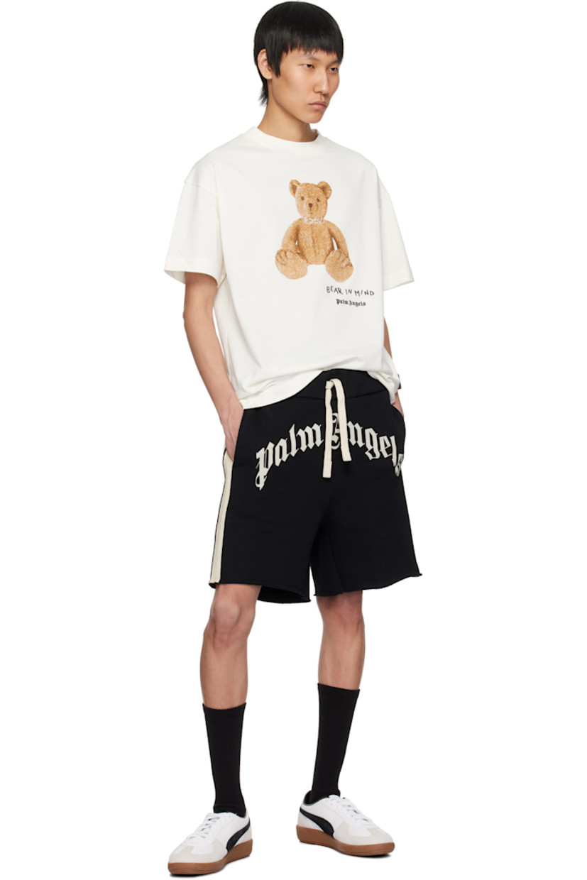 Cotton jersey T-shirt. 

· Rib-knit crewneck
· Graphic printed at front
· Logo and text bonded at front
· Logo flag at side seam
· Dropped shoulders

Supplier color: Brown/Grey
