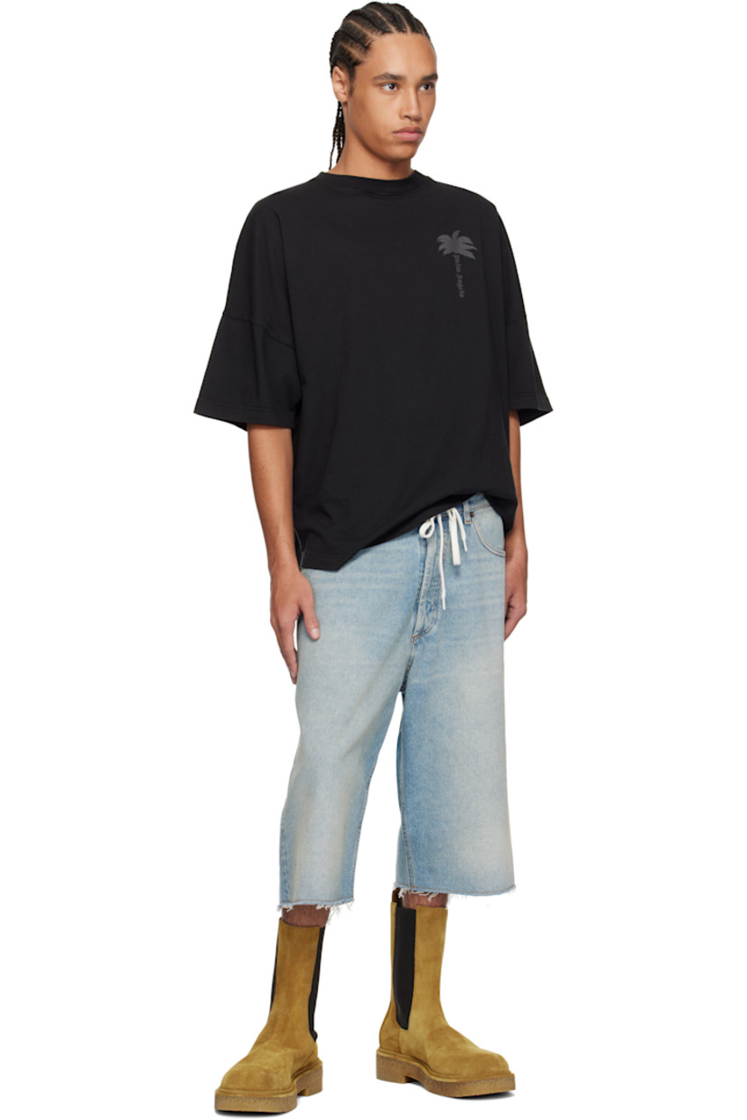 Oversized cotton jersey T-shirt.

· Rib-knit crewneck
· Logo graphic printed at chest
· Curved hem
· Logo flag at side seam
· Dropped shoulders
· Graphics printed at back

Supplier color: Black/Vintage black