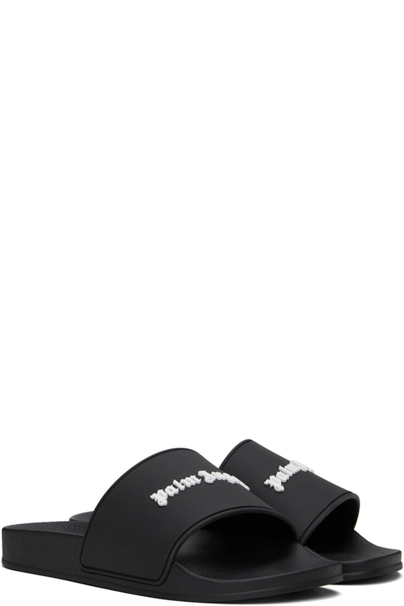 Rubber pool slides in black.

· Open toe
· Logo embossed at vamp
· Logo embossed at molded footbed
· Treaded rubber sole

Supplier color: Black/White