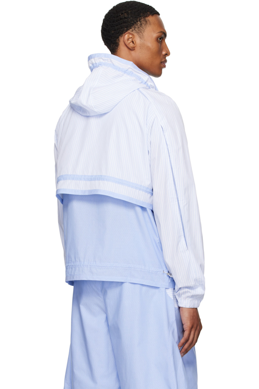 Cotton poplin jacket.

· Striped pattern throughout
· Paneled construction
· Bungee-style drawstring at hood
· Zip closure
· Bead hardware at front
· Welt pockets at waist
· Bungee-style drawstring at waist and hem
· Raglan sleeves
· Elasticized cuffs
· Silver-tone hardware

Supplier color: Azure stripe