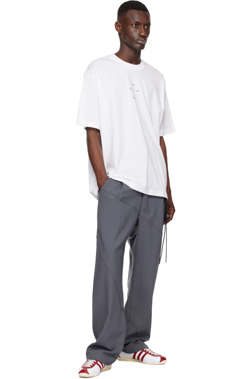 Cotton jersey T-shirt.

· Rib-knit crewneck
· Logo printed at chest
· Dropped shoulders
· Graphic printed at back

Supplier color: White