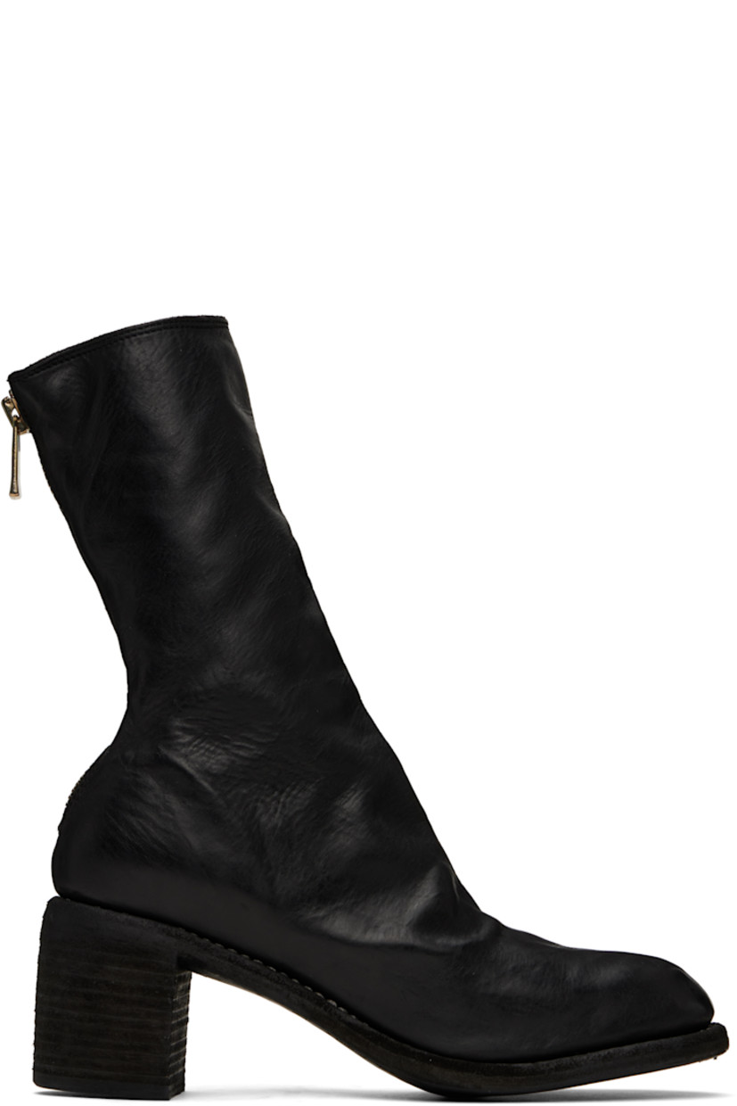 Ankle-high full-grain horse leather boots in black.

· Zip closure at heel
· Topstitching at Goodyear welt
· Stacked leather block heel
· Leather sole
· Logo-engraved oxidized silver-tone hardware
· Heel: H2.5"

Supplier color: Black