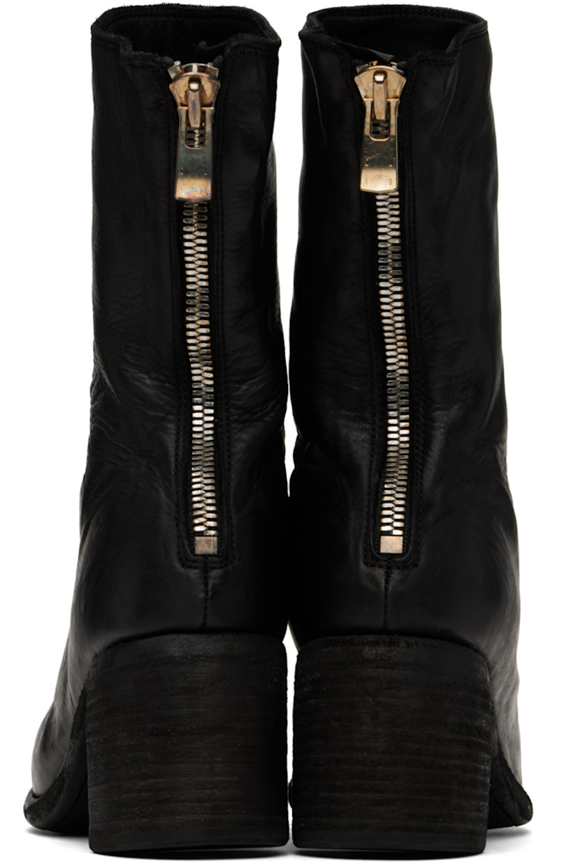 Ankle-high full-grain horse leather boots in black.

· Zip closure at heel
· Topstitching at Goodyear welt
· Stacked leather block heel
· Leather sole
· Logo-engraved oxidized silver-tone hardware
· Heel: H2.5"

Supplier color: Black