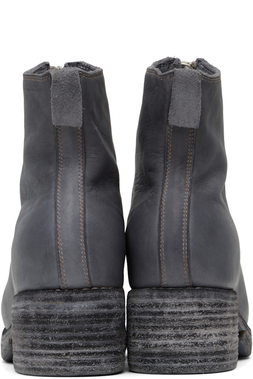 Ankle-high piece-dyed grained horse leather boots in gray.

· Zip closure at vamp
· Pull-tab at heel collar
· Goodyear welt
· Stacked leather block heel
· Leather sole
· Logo-engraved silver-tone hardware
· Pair of treaded Vibram rubber soles included
· Heel: H2"

Supplier color: Grey