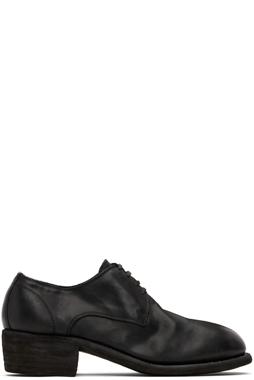Piece-dyed grained kangaroo leather derbys. 

· Lace-up closure
· Grained leather lining
· Topstitching at Goodyear welt 
· Stacked leather heel
· Leather sole
· Heel: H1.75"

Supplier color: Black