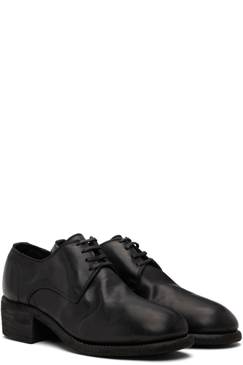 Piece-dyed grained kangaroo leather derbys. 

· Lace-up closure
· Grained leather lining
· Topstitching at Goodyear welt 
· Stacked leather heel
· Leather sole
· Heel: H1.75"

Supplier color: Black