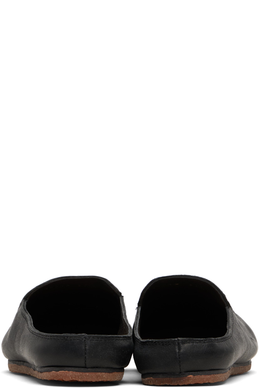 Grained leather slip-on loafers. 

· Grained leather lining
· Logo embossed at footbed
· Crêpe rubber sole

Supplier color: Black