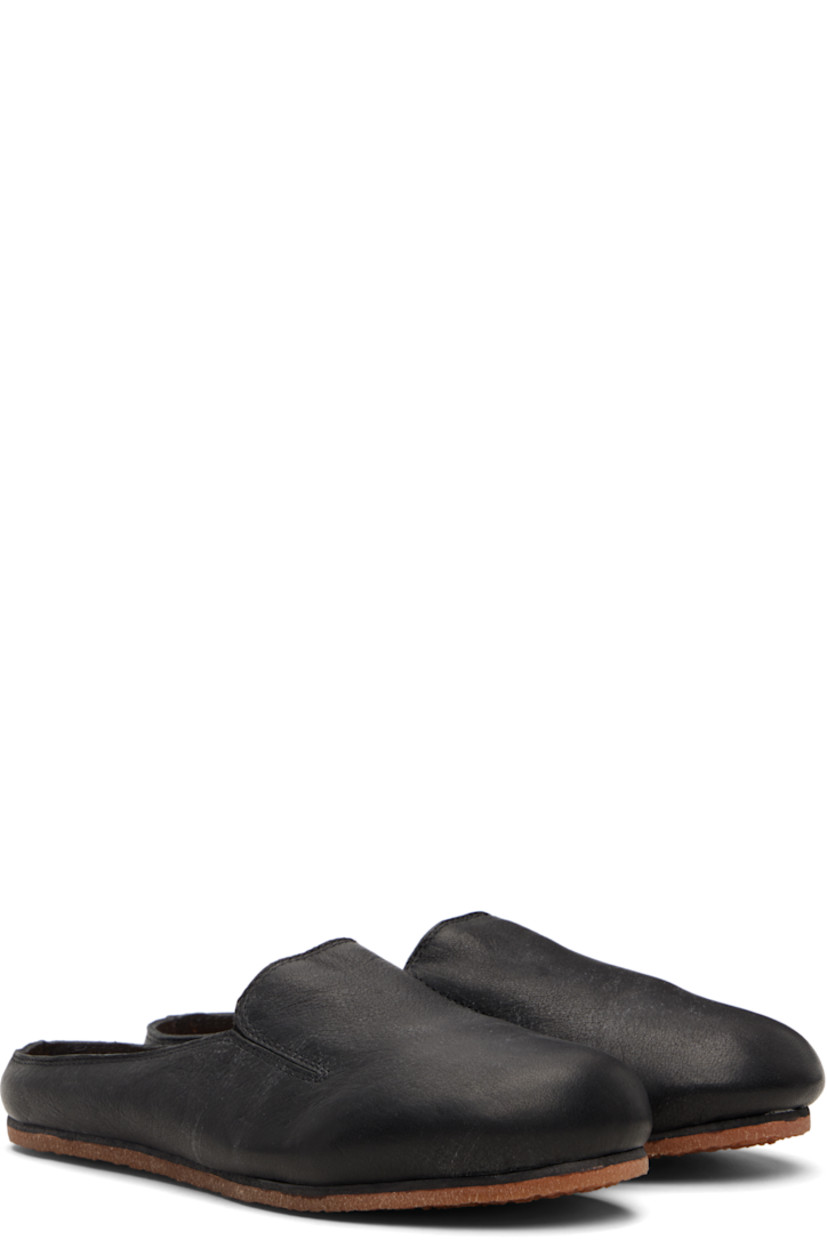 Grained leather slip-on loafers. 

· Grained leather lining
· Logo embossed at footbed
· Crêpe rubber sole

Supplier color: Black