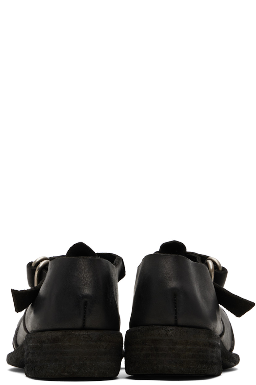 Grained leather flat sandals. 

· Cutouts throughout
· Pin-buckle ankle strap
· Logo embossed at footbed
· Topstitching at welt
· Stacked leather heel 
· Leather sole

Supplier color: Black