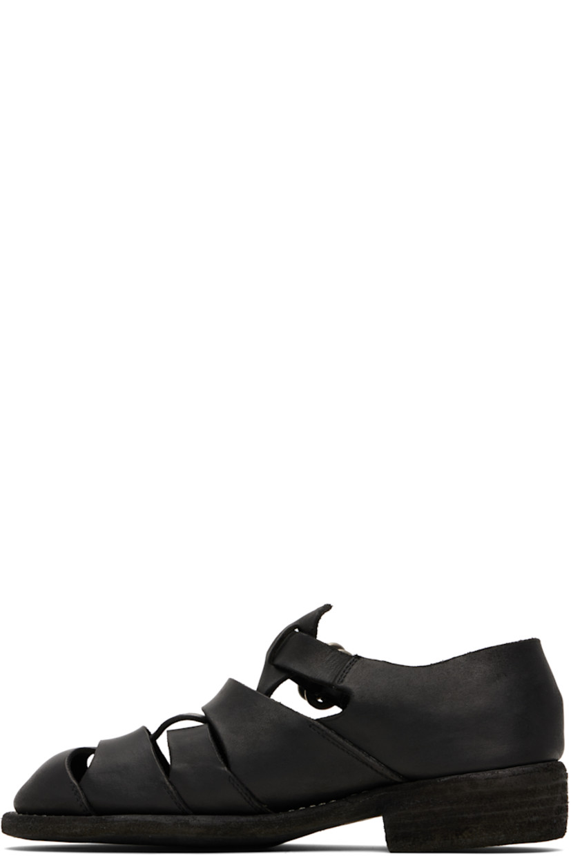 Grained leather flat sandals. 

· Cutouts throughout
· Pin-buckle ankle strap
· Logo embossed at footbed
· Topstitching at welt
· Stacked leather heel 
· Leather sole

Supplier color: Black