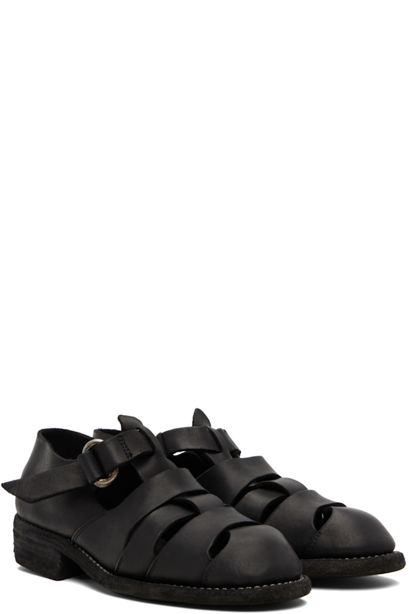 Grained leather flat sandals. 

· Cutouts throughout
· Pin-buckle ankle strap
· Logo embossed at footbed
· Topstitching at welt
· Stacked leather heel 
· Leather sole

Supplier color: Black