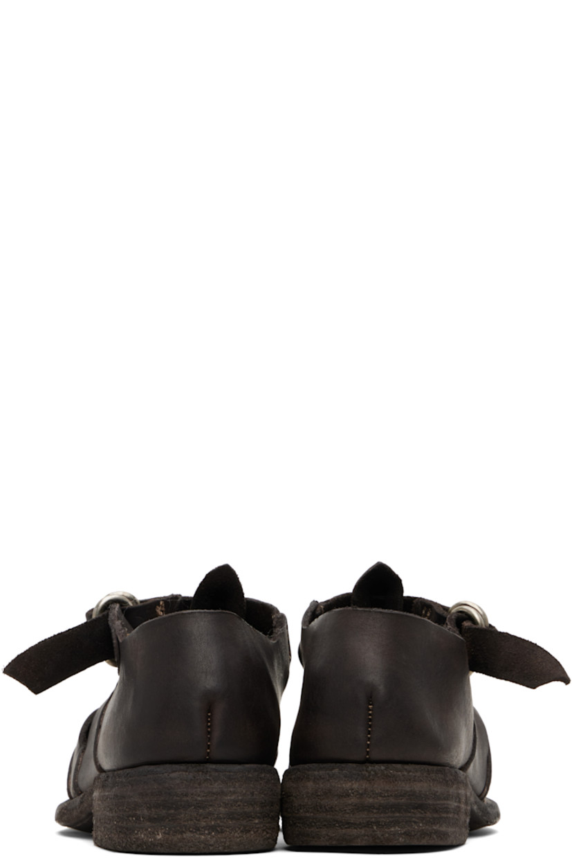 Grained leather flat sandals. 

· Cutouts throughout
· Pin-buckle ankle strap
· Logo embossed at footbed
· Topstitching at welt
· Stacked leather heel 
· Leather sole

Supplier color: Dark brown