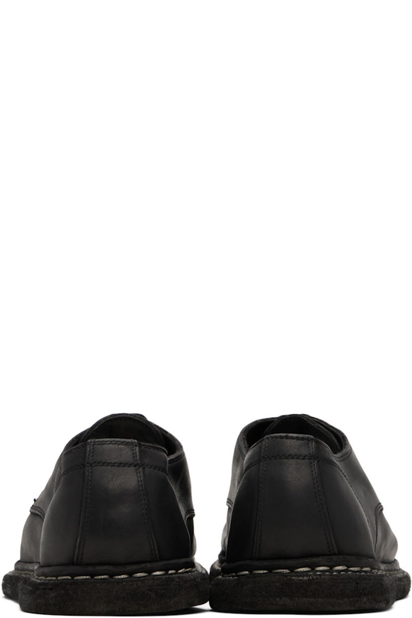Grained horse leather oxfords. 

· Lace-up closure
· Topstitching at welt
· Leather sole

Supplier color: Black