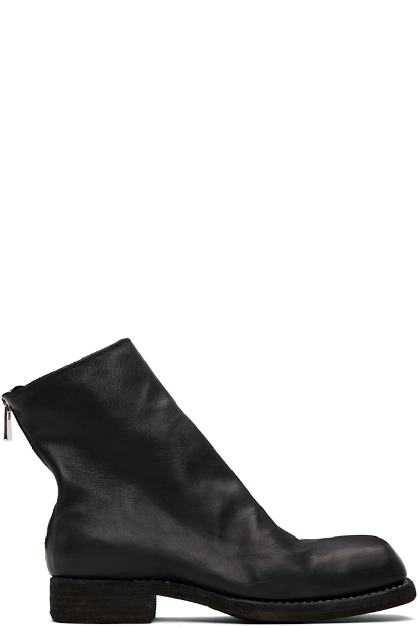 Ankle-high piece-dyed grained horse leather boots.

· Square toe
· Zip closure at heel
· Full nubuck lining
· Topstitching at Goodyear welt
· Stacked leather heel 
· Leather sole
· Logo-engraved antiqued silver-tone hardware
· Heel: H1.25"

Supplier color: Black