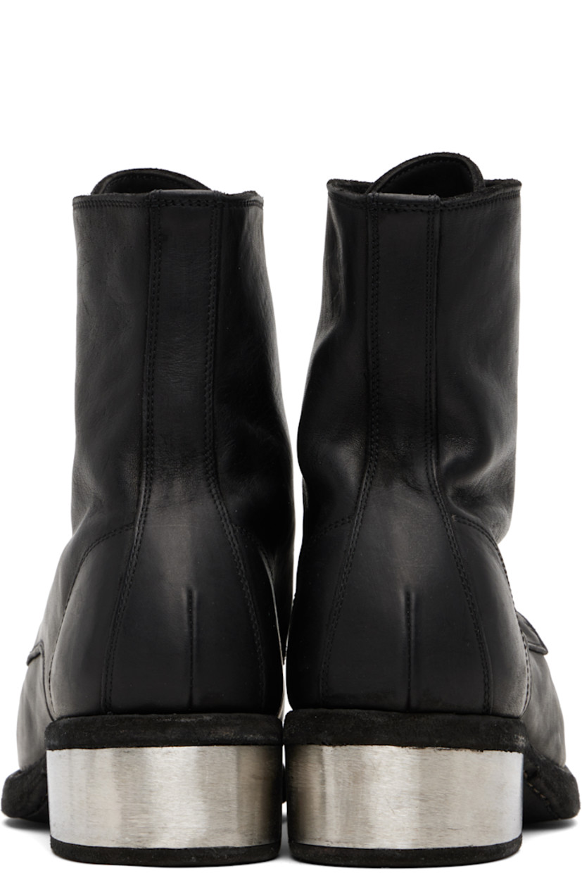 Ankle-high piece-dyed grained horse leather boots. 

· Lace-up closure
· Full nubuck lining
· Topstitching at Goodyear welt
· Metal block heel 
· Leather sole 
· Heel: H1.75"

Supplier color: Black
