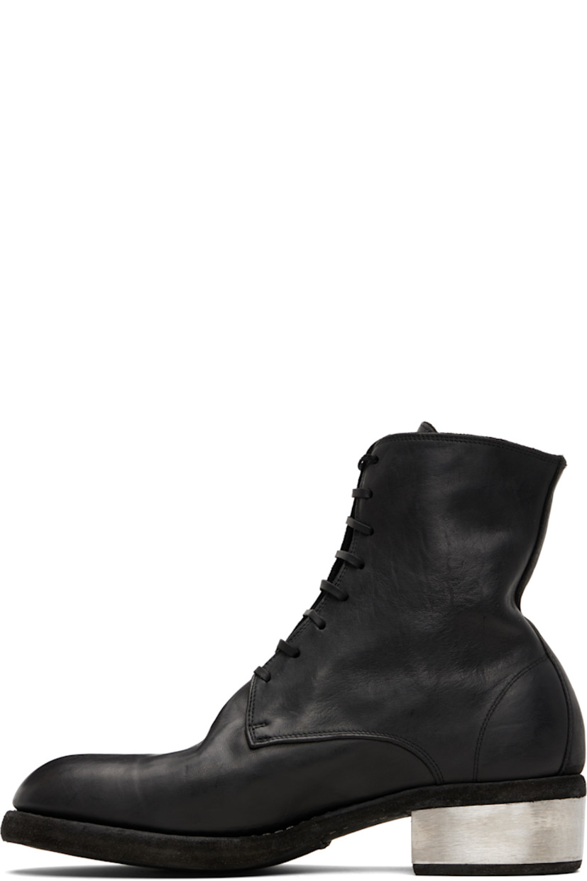 Ankle-high piece-dyed grained horse leather boots. 

· Lace-up closure
· Full nubuck lining
· Topstitching at Goodyear welt
· Metal block heel 
· Leather sole 
· Heel: H1.75"

Supplier color: Black