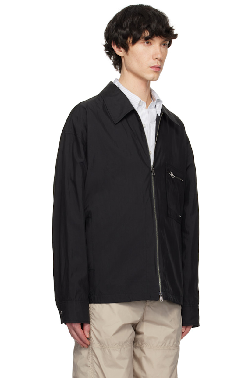 Lyocell- and nylon-blend taffeta jacket.

· Spread collar
· Two-way zip closure
· Zip pocket at chest
· Logo hardware at front
· Welt pockets
· Bungee-style drawstring at hem
· Adjustable press-stud barrel cuffs
· Logo hardware at back collar
· Pleats at back yoke

Supplier color: Black