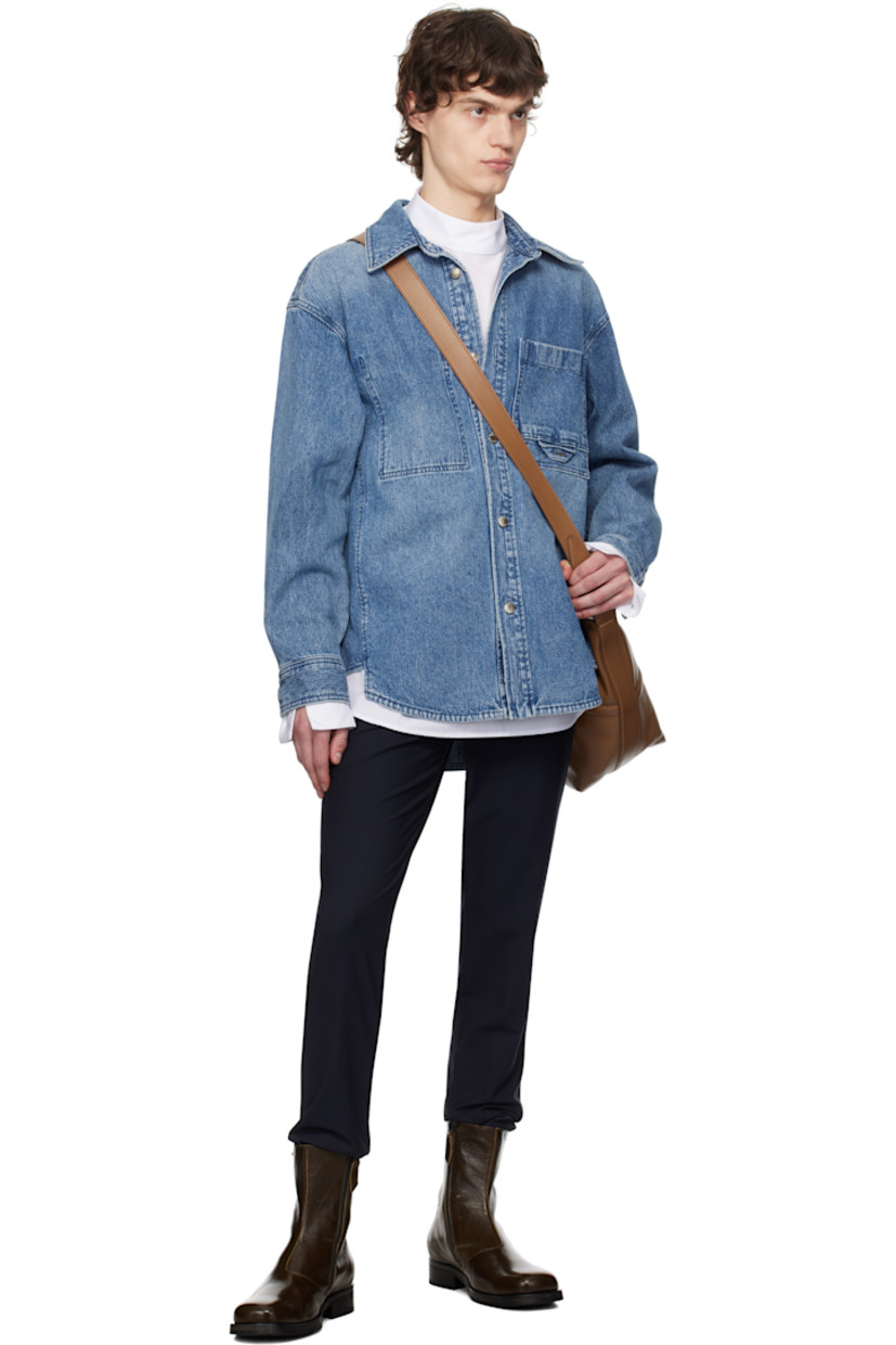 Plain-woven stretch wool-blend trousers.

· Belt loops 
· Concealed drawstring at partially elasticized waistband
· Four-pocket styling
· Zip fly
· Logo hardware at belt loop
· Rib-knit cuffs

Supplier color: Navy