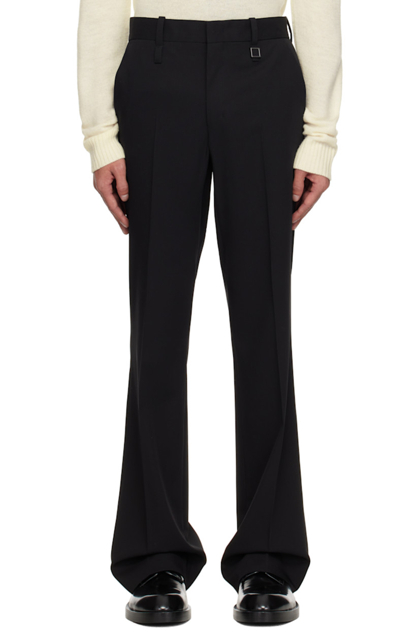 Straight leg wool twill trousers.

· Belt loops
· Four-pocket styling
· Zip fly
· Logo hardware at belt loop
· Creased legs
· Darts at back waistband

Supplier color: Black