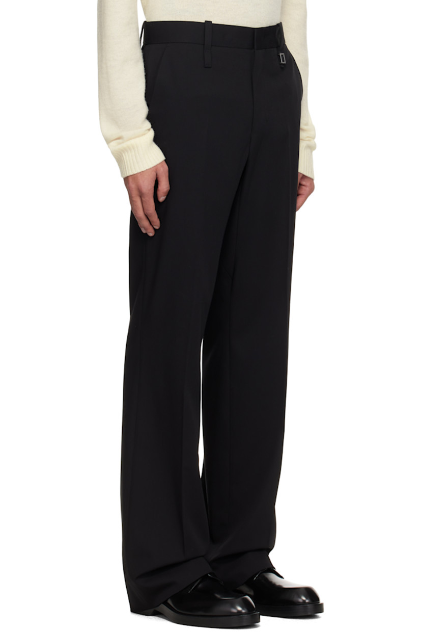 Straight leg wool twill trousers.

· Belt loops
· Four-pocket styling
· Zip fly
· Logo hardware at belt loop
· Creased legs
· Darts at back waistband

Supplier color: Black