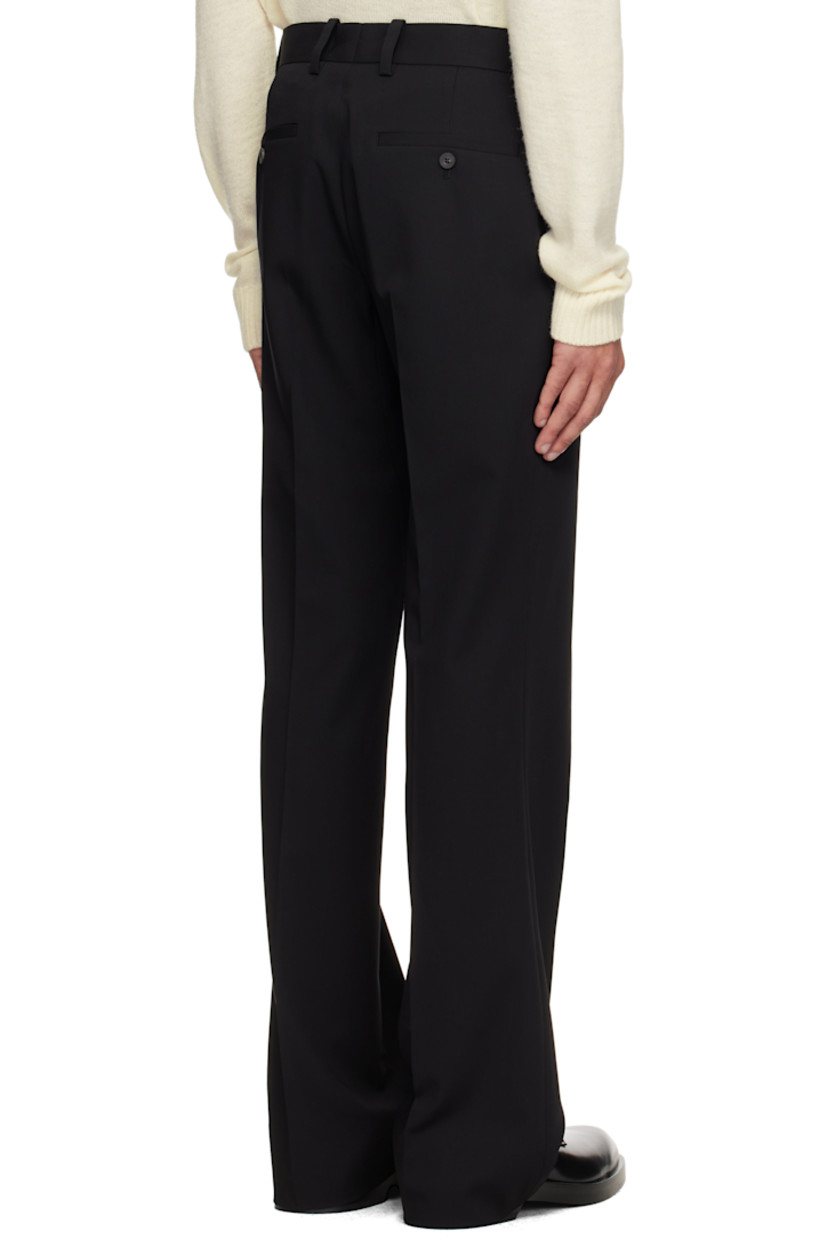Straight leg wool twill trousers.

· Belt loops
· Four-pocket styling
· Zip fly
· Logo hardware at belt loop
· Creased legs
· Darts at back waistband

Supplier color: Black