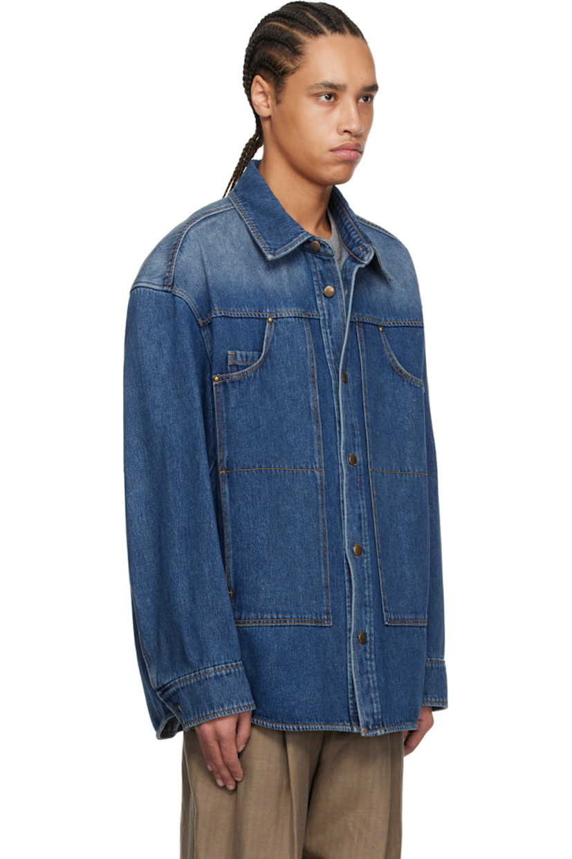 Non-stretch denim shirt. Fading throughout.

· Spread collar
· Button closure
· Patch pockets
· Shirttail hem
· Dropped shoulders
· Buttoned barrel cuffs
· Logo hardware at back collar
· Twin pleats at back yoke
· Logo-engraved antiqued gold-tone hardware
· Contrast stitching in tan

Supplier color: Blue