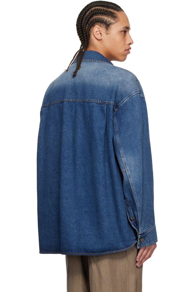 Non-stretch denim shirt. Fading throughout.

· Spread collar
· Button closure
· Patch pockets
· Shirttail hem
· Dropped shoulders
· Buttoned barrel cuffs
· Logo hardware at back collar
· Twin pleats at back yoke
· Logo-engraved antiqued gold-tone hardware
· Contrast stitching in tan

Supplier color: Blue