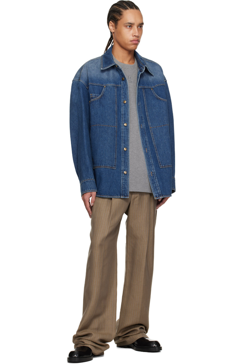Non-stretch denim shirt. Fading throughout.

· Spread collar
· Button closure
· Patch pockets
· Shirttail hem
· Dropped shoulders
· Buttoned barrel cuffs
· Logo hardware at back collar
· Twin pleats at back yoke
· Logo-engraved antiqued gold-tone hardware
· Contrast stitching in tan

Supplier color: Blue