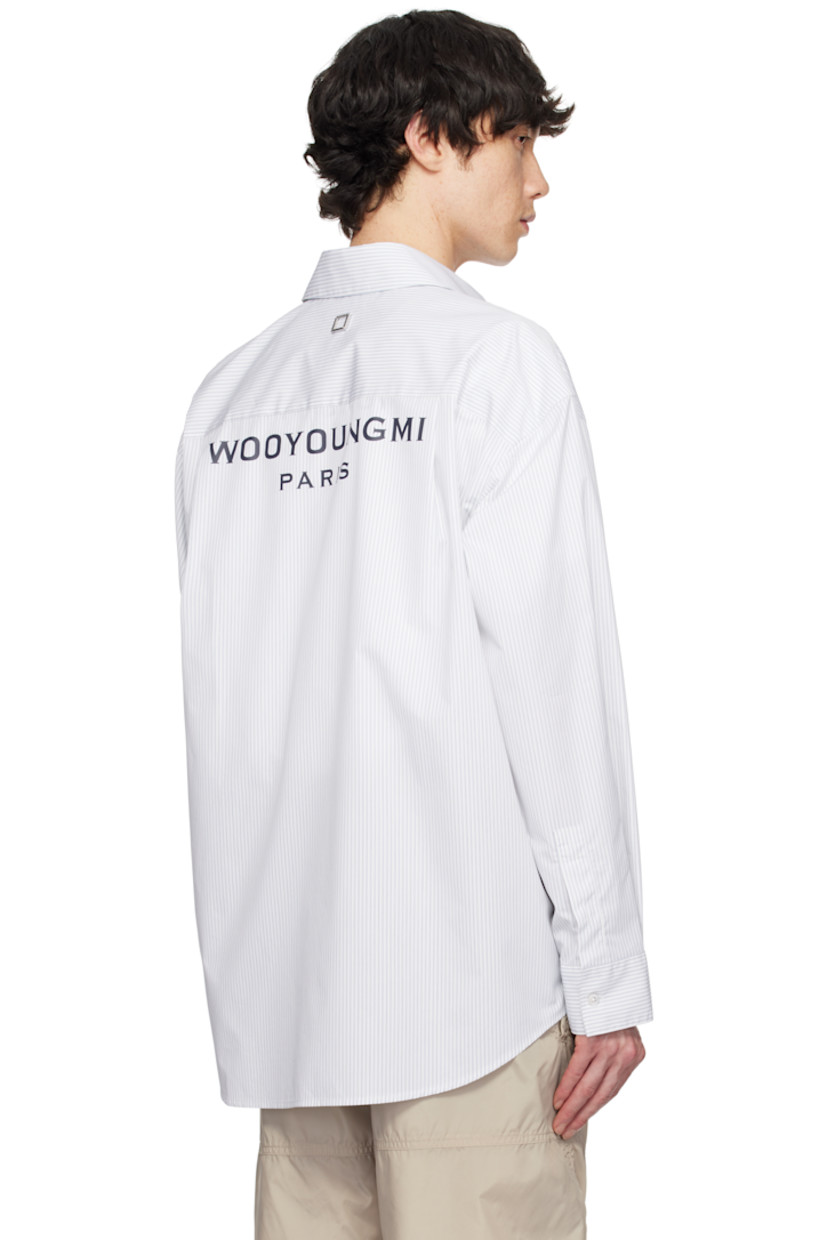 Cotton-blend oxford cloth shirt. Stripes throughout.

· Spread collar
· Button closure
· Logo hardware at patch pocket and back collar
· Button vent at side seams
· Single-button barrel cuffs
· Pleats at back yoke
· Logo printed at back

Supplier color: Blue