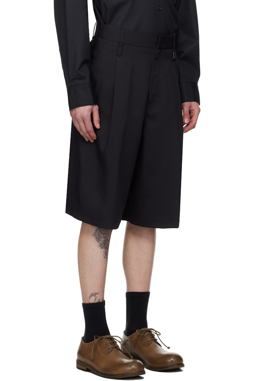 Polyester twill shorts.

· Belt loops
· Four-pocket styling
· Zip fly
· Logo hardware at belt loop
· Pleats at front

Supplier color: Black