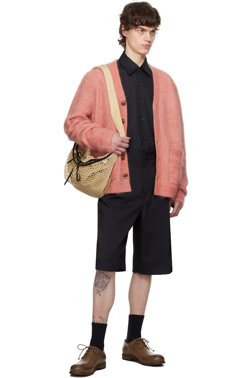 Polyester twill shorts.

· Belt loops
· Four-pocket styling
· Zip fly
· Logo hardware at belt loop
· Pleats at front

Supplier color: Black