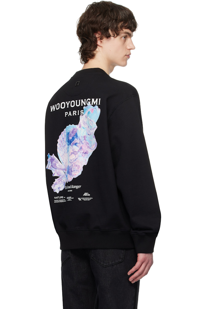 French terry sweatshirt.

· Rib-knit crewneck, hem, and cuffs
· Embroidered logo patch at chest
· Logo hardware at back collar
· Logo, graphic, and text printed at back

Supplier color: Black
