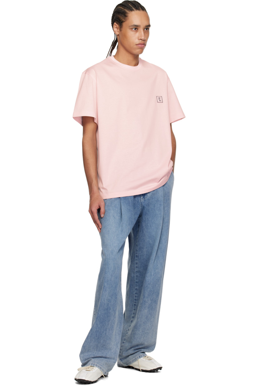 Cotton jersey T-shirt.

· Rib-knit crewneck
· Embroidered logo patch at chest
· Vented side seams
· Logo hardware at back collar
· Logo printed at back

Supplier color: Pink