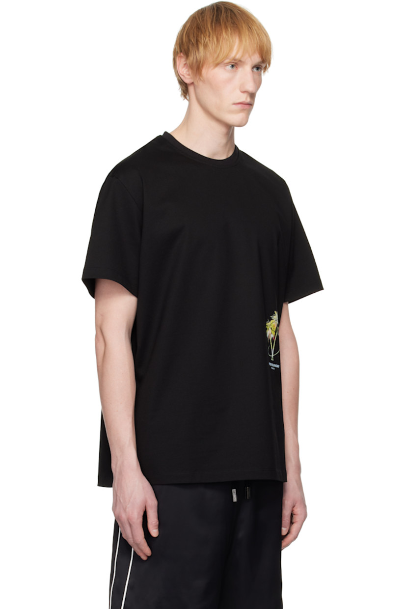 Cotton jersey T-shirt. 

· Rib-knit crewneck
· Logo and graphic printed at front
· Dropped shoulders
· Vented side seams 
· Logo hardware at back collar
· Logo, graphic, and text printed at back

Supplier color: Black