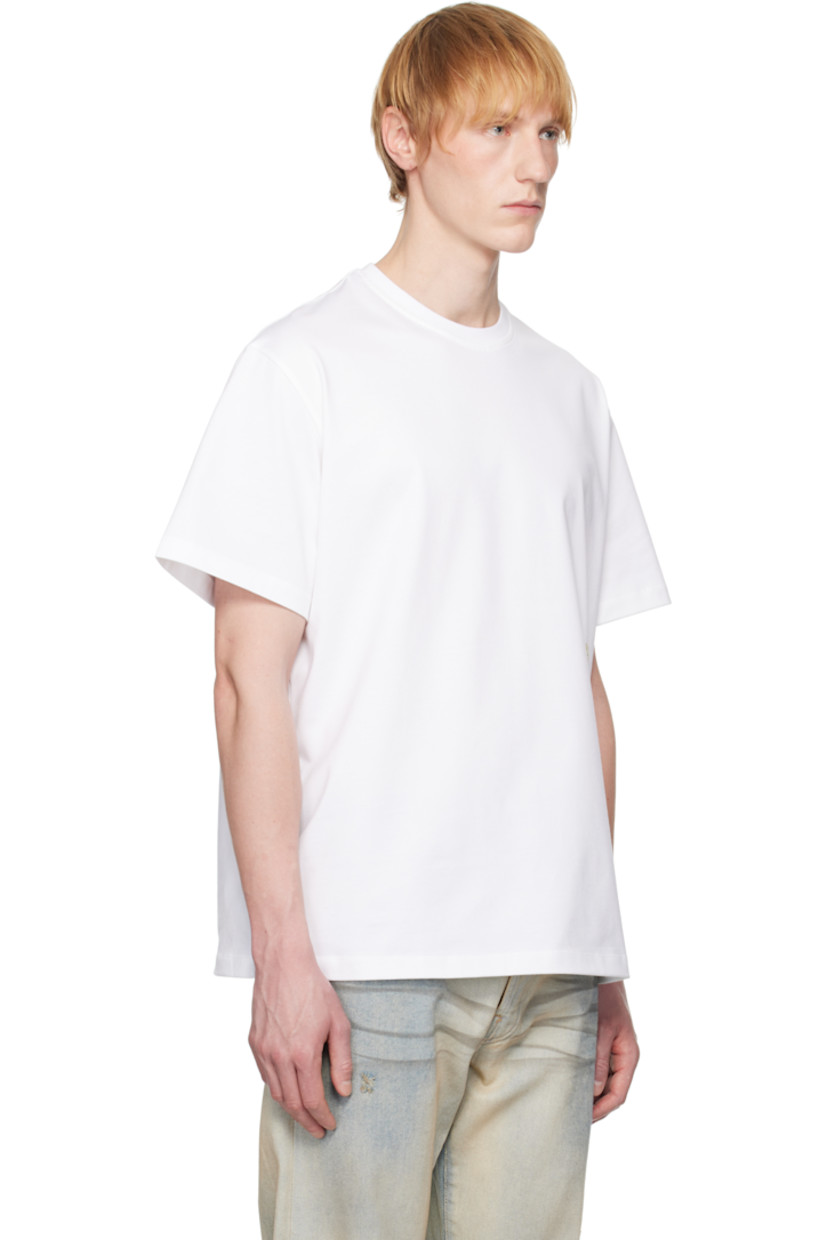 Cotton jersey T-shirt. 

· Rib-knit crewneck
· Logo and graphic printed at front
· Dropped shoulders
· Vented side seams 
· Logo hardware at back collar
· Logo, graphic, and text printed at back

Supplier color: White