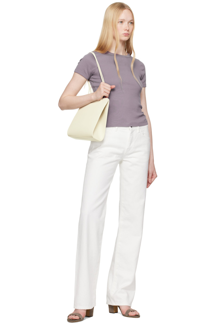 Waxed and double-tanned calfskin shoulder bag in off-white.

· Twin shoulder straps
· Patch pocket at face
· Magnetic closure
· Patch pocket at interior
· Cotton twill lining
· H10" x W9" x D3.5"

Supplier color: Tofu