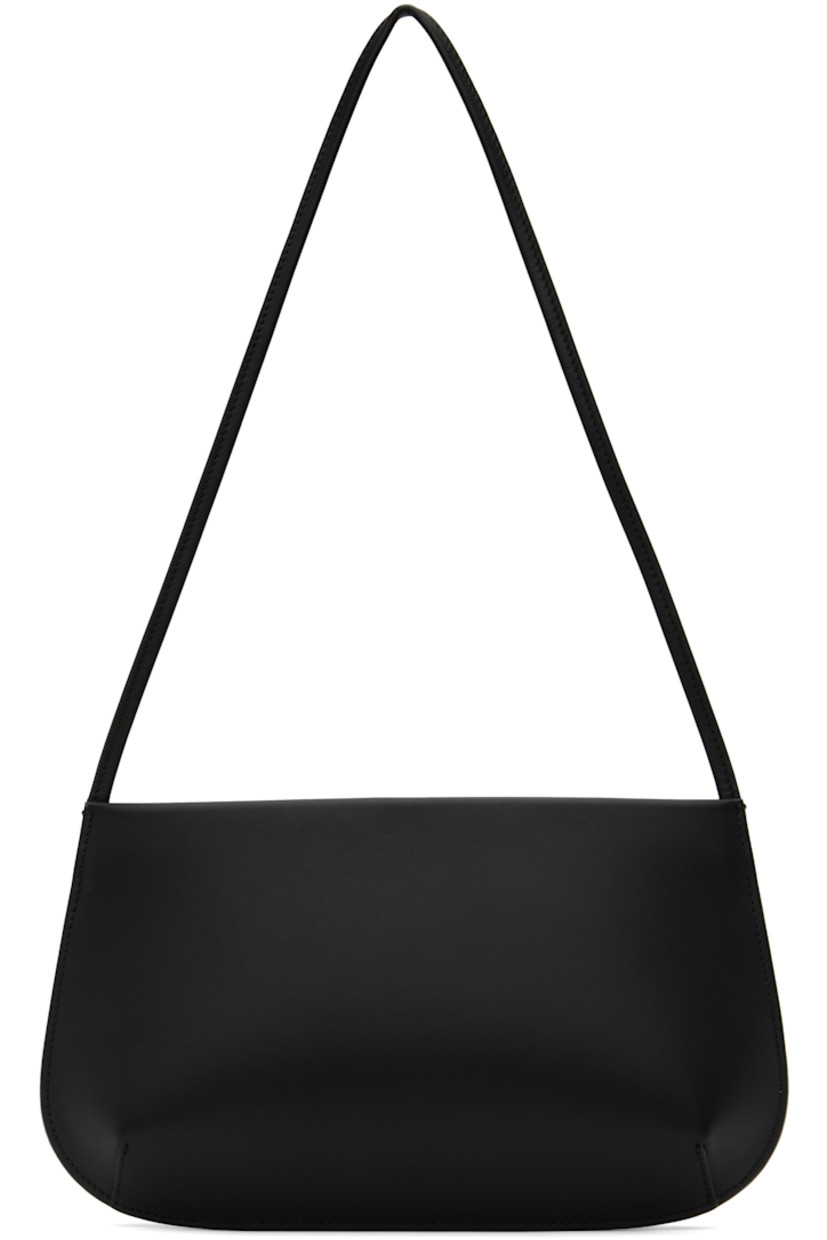 Double-tanned buffed calfskin shoulder bag in black.

· Fixed shoulder strap
· Magnetic closure
· Patch pocket at interior 
· Twill lining
· H6.5" x W11.5" x D2"

Supplier color: Noir