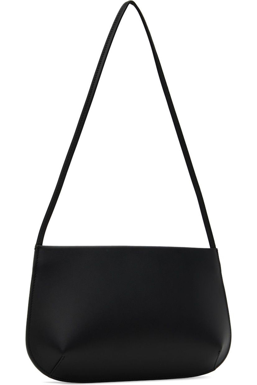 Double-tanned buffed calfskin shoulder bag in black.

· Fixed shoulder strap
· Magnetic closure
· Patch pocket at interior 
· Twill lining
· H6.5" x W11.5" x D2"

Supplier color: Noir