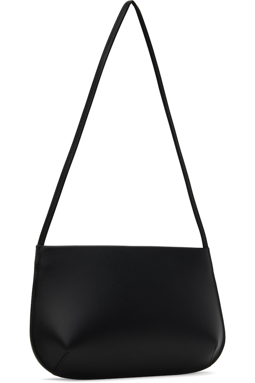 Double-tanned buffed calfskin shoulder bag in black.

· Fixed shoulder strap
· Magnetic closure
· Patch pocket at interior 
· Twill lining
· H6.5" x W11.5" x D2"

Supplier color: Noir