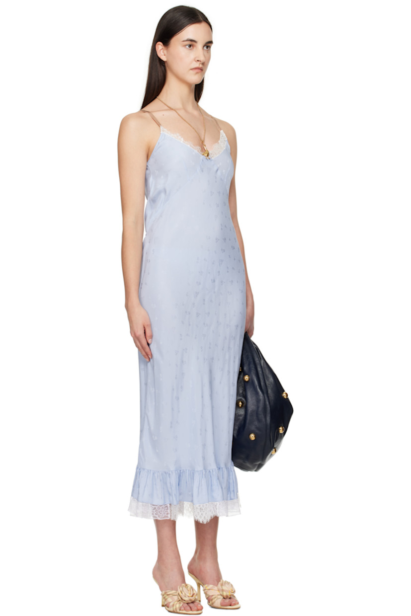 Viscose- and silk-blend sateen maxi dress. Jacquard floral pattern throughout. 

· Lace trim at V-neck and ruffled hem 
· Adjustable spaghetti straps
· Self-tie fastening at back waist
· Unlined

Supplier color: Light blue