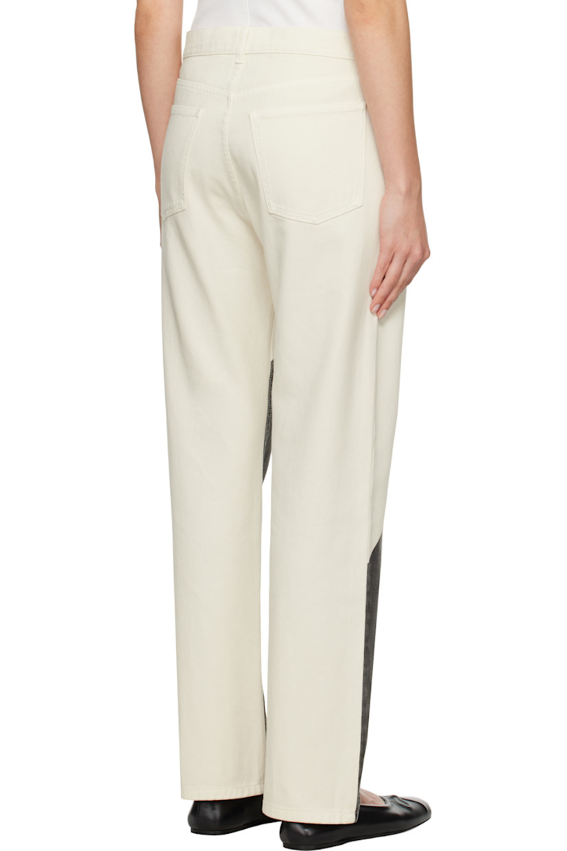 Non-stretch denim jeans.

· Belt loops
· Five-pocket styling
· Button-fly
· Logo patch at coin pocket
· Graphic printed at front legs
· Logo-engraved silver-tone hardware
· Contrast stitching in white 

Supplier color: Multi Ivory
