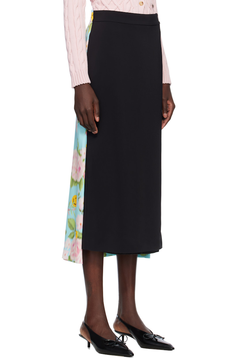 Stretch viscose crêpe and silk satin midi skirt.

· Paneled construction
· Two-pocket styling
· Raw edge at front hem
· Concealed zip closure at side
· Vented side seams
· Logo graphic and floral pattern printed at back
· Zip closure at back waist
· Central slit at back hem

Part of the Moschino Smiley® collection.

Supplier color: Black