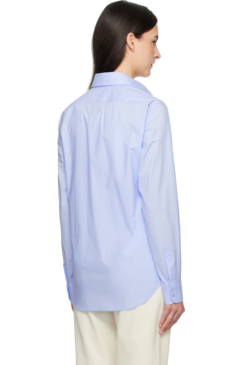 Stretch cotton poplin shirt.

· Spread collar
· Button closure
· Logo graphic embroidered at chest
· Shirttail hem
· Pleats at single-button barrel cuffs

Supplier color: Multi light blue