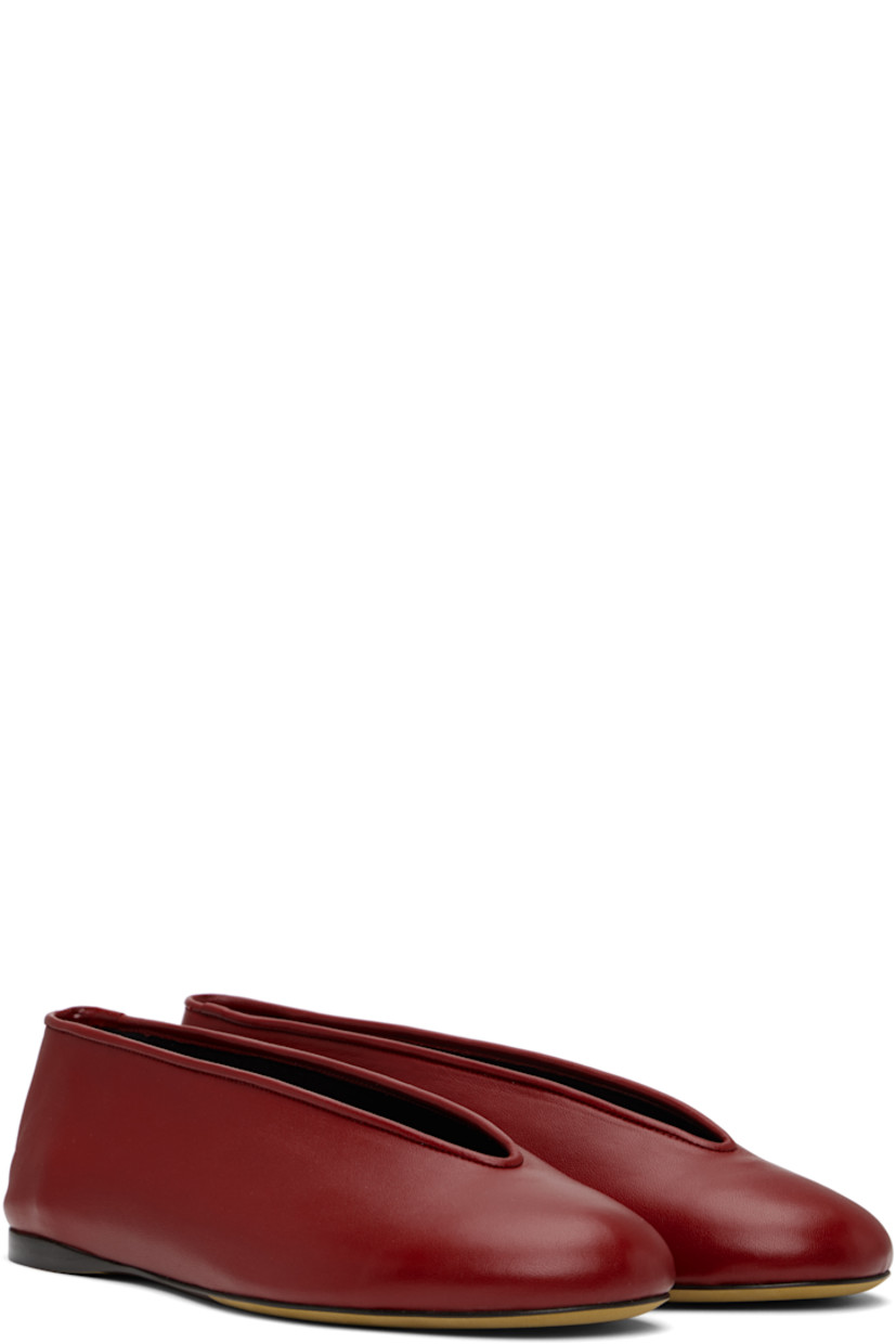 Grained faux-leather ballerina flats in red.

· Piping at collar 
· Canvas lining 
· Suede sole 

Supplier color: Red