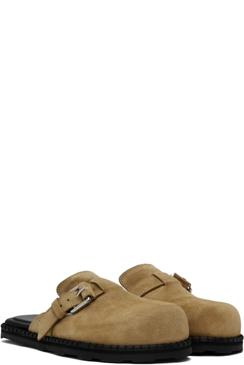 Suede slip-on loafers in beige.

· Pin-buckle strap at vamp
· Logo printed at padded leather footbed
· Foam rubber midsole
· Treaded rubber sole

Supplier color: Beige