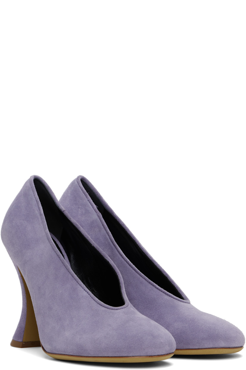 Suede heels in purple. 

· Piping at collar
· Grained leather lining 
· Covered spool heel with rubber injection
· Leather sole 
· Heel: H4"

Supplier color: Lilac